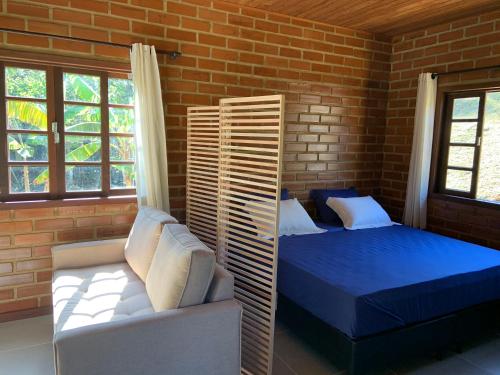 Cama o camas de una habitación en Cactus Chalés & Cabanas em lumiar