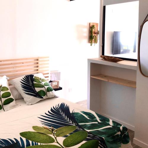 Llit o llits en una habitació de Coco View