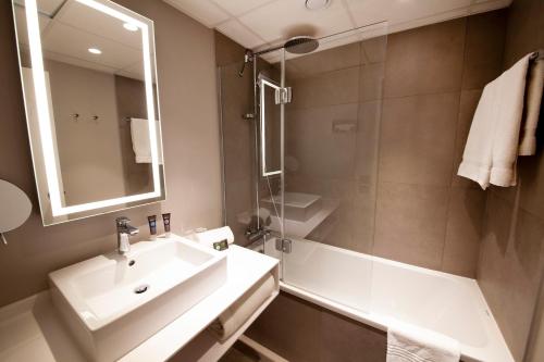Koupelna v ubytování Novotel Clermont-Ferrand