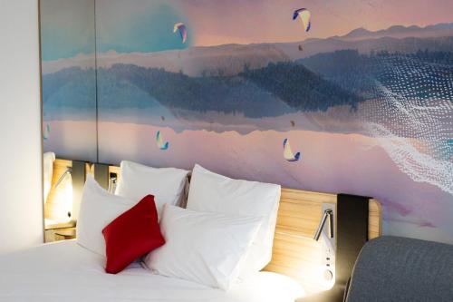 Postel nebo postele na pokoji v ubytování Novotel Clermont-Ferrand