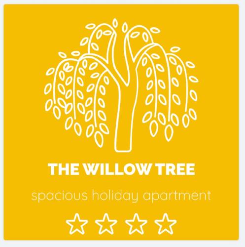 a logo for the willow tree grassroots holiday appointment at Apartment Spacious Liman in Novi Sad
