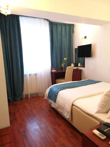 Televisyen dan/atau pusat hiburan di Atrium Hotel Bucharest City Center