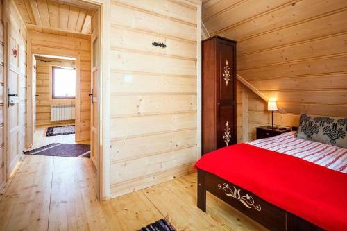 Postel nebo postele na pokoji v ubytování Domek Wierchowa