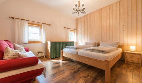 Postel nebo postele na pokoji v ubytování Das Haus am Grundlsee