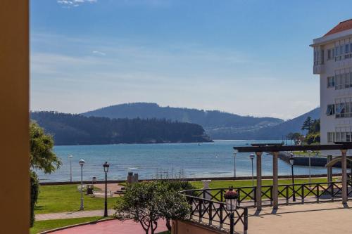 a view of a body of water from a building at Hostal Chelsea in Cedeira