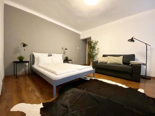 Posteľ alebo postele v izbe v ubytovaní Budget Apartment by Hi5- Károly 16