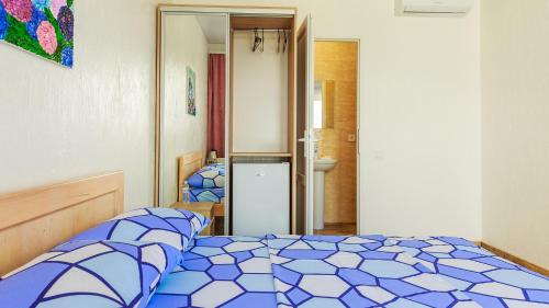 Postel nebo postele na pokoji v ubytování Villa Shell