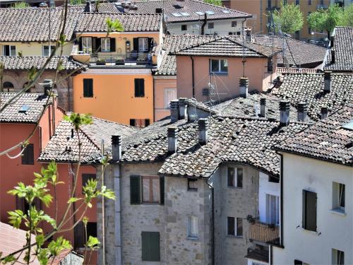 a view of roofs of houses in a city at Hotel Santoli in Porretta Terme