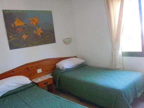 Säng eller sängar i ett rum på Family Apartment 1 bedroom with Pool View - Oasis Duna Resort
