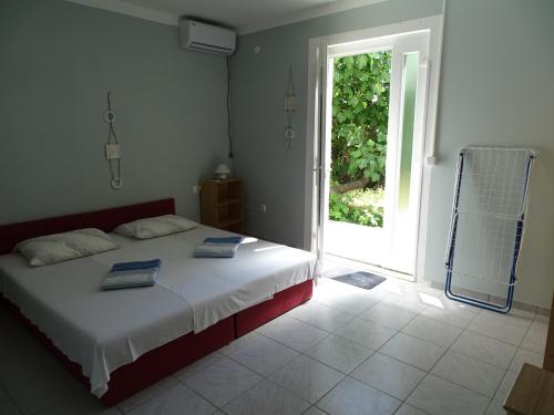 Postel nebo postele na pokoji v ubytování Apartment Lea