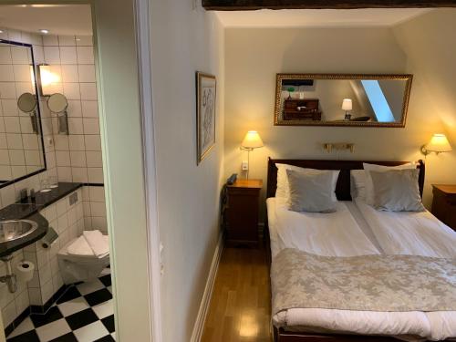 Koupelna v ubytování Mayfair Hotel Tunneln