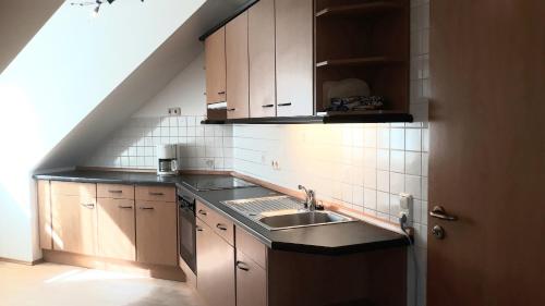 Virtuvė arba virtuvėlė apgyvendinimo įstaigoje Ferienhof Lang