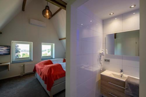 Ένα ή περισσότερα κρεβάτια σε δωμάτιο στο Hotel Bergrust