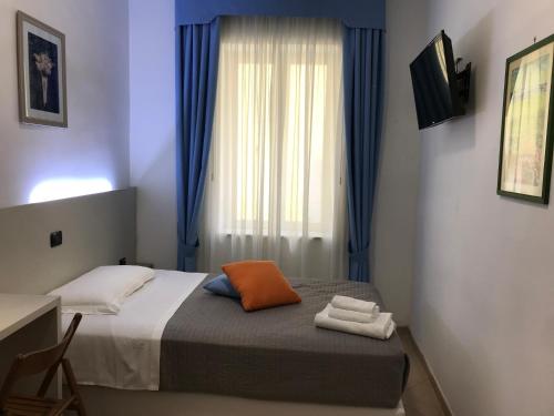 Postel nebo postele na pokoji v ubytování San Marco Hotel
