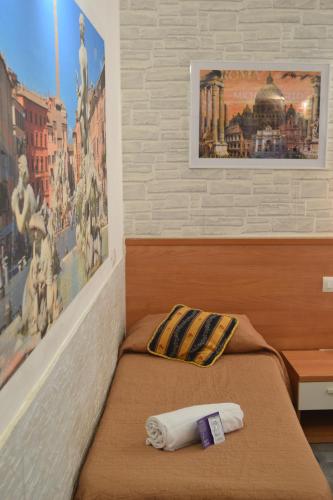 Letto o letti in una camera di A&F Colosseo