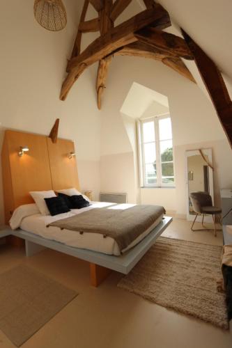 Katil atau katil-katil dalam bilik di Vignoble Château Piéguë - winery