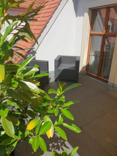 Гостиная зона в Modernes Apartment an der Frauenkirche