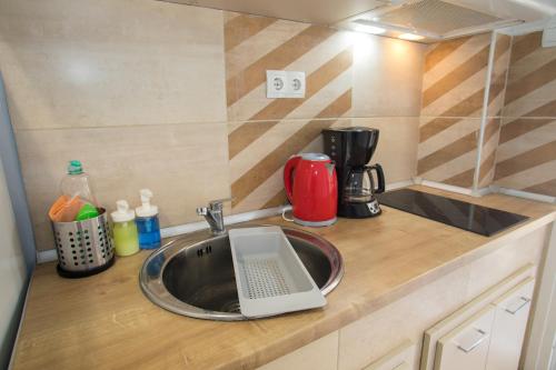 Η κουζίνα ή μικρή κουζίνα στο Central Studio Flat