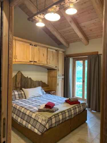 A bed or beds in a room at LA DRIT