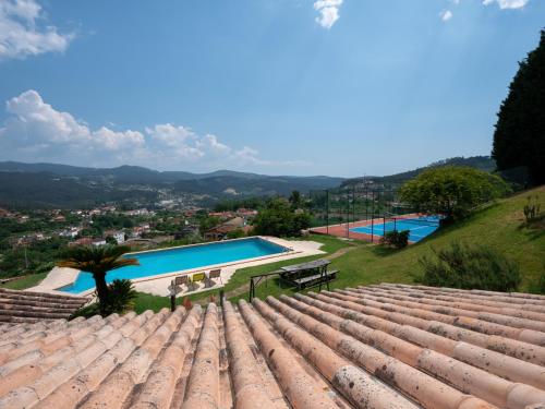 a view of the pool from the roof of a house at Quinta do Souto in Sever do Vouga