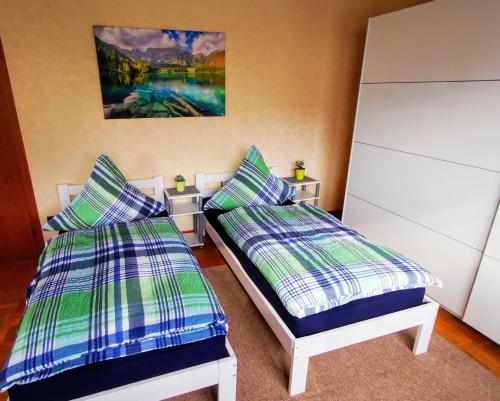 Postel nebo postele na pokoji v ubytování Ferienwohnung Maria Laach 3