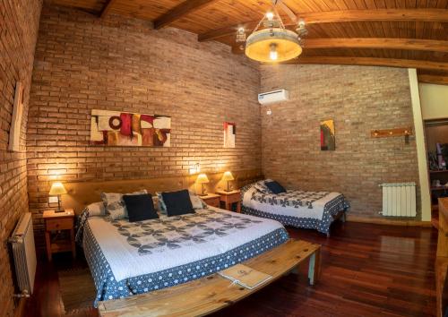 Katil atau katil-katil dalam bilik di Lujan De Cuyo B&B
