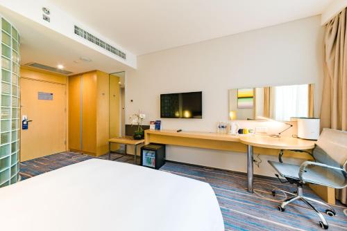 TV a/nebo společenská místnost v ubytování Holiday Inn Express Shijiazhuang Heping by IHG