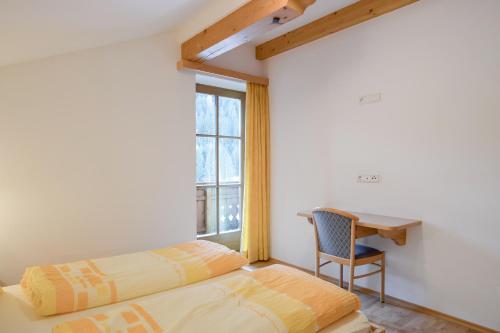 Voodi või voodid majutusasutuse Wieserhof - Apartment Philipp toas
