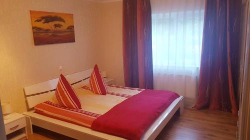 A bed or beds in a room at Apartment Koblenz
