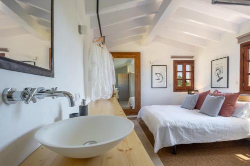 A bed or beds in a room at Villa Corb Mari by Sun Villas Mallorca