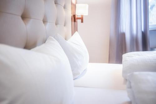 Ένα ή περισσότερα κρεβάτια σε δωμάτιο στο Hotel Ehranger Hof