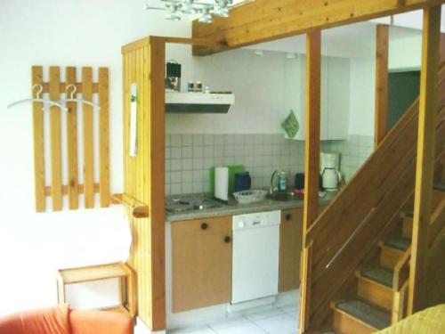 Köök või kööginurk majutusasutuses Ferienanlage Amwalde - Retro Ferienwohnung C5