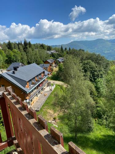 a view from the balcony of a house in the mountains at Studio 4 pers vue magnifique 100m des pistes in Ax-les-Thermes