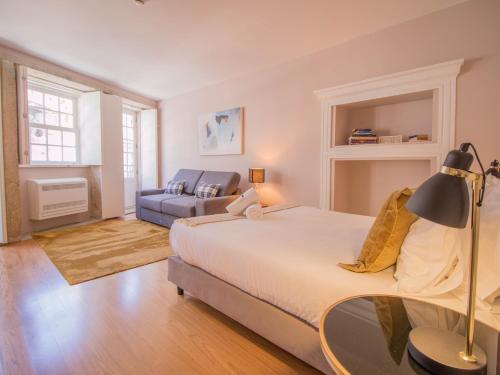 En eller flere senge i et værelse på ALIBI by YoursPorto