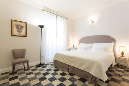 Cama o camas de una habitación en San Carlo Suites