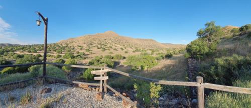 a trail in the middle of a hill at Casas Rurales La Minilla in Los Albaricoques