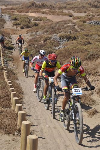 a group of people riding bikes down a dirt road at Wild House in Las Palmas de Gran Canaria