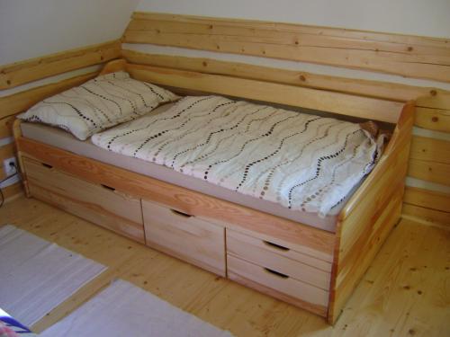 מיטה או מיטות בחדר ב-Nasa Chata
