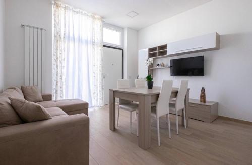 A television and/or entertainment centre at Le bougainvillea 2