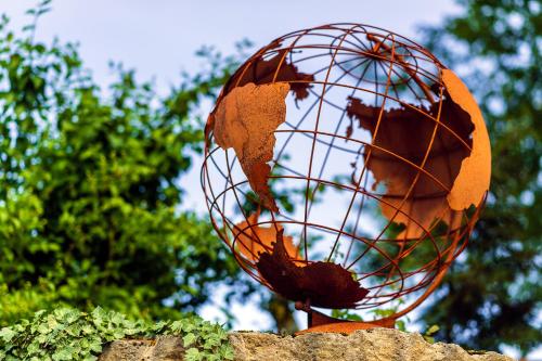 a statue of a world in a wire at Parkhotel Hohnstein by STEIGER Hotels in Hohnstein