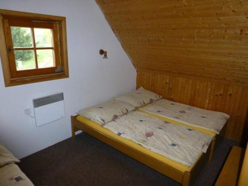 Postel nebo postele na pokoji v ubytování Bret CZ