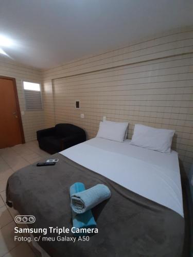Posteľ alebo postele v izbe v ubytovaní Flats Bueno em Goiânia