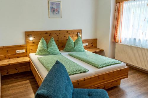 Postel nebo postele na pokoji v ubytování Haus Mandl