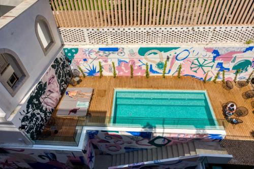 an overhead view of a swimming pool in a house at Secret Patio Lisbon in Lisbon