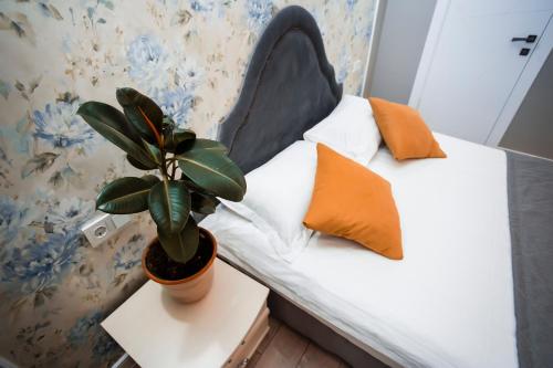 Postel nebo postele na pokoji v ubytování ARENA Hotel