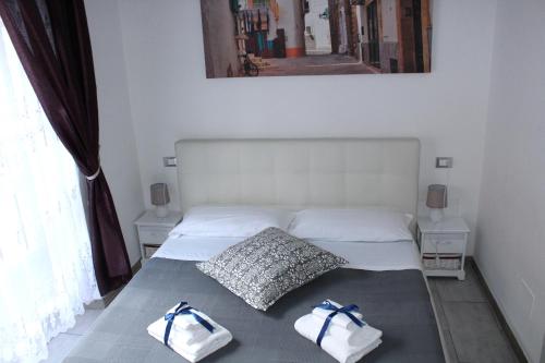 Katil atau katil-katil dalam bilik di La Suite Rooms & Apartments