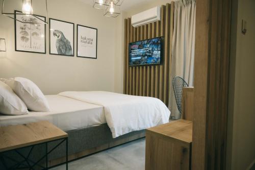 Säng eller sängar i ett rum på Hotel Hermes Pieria