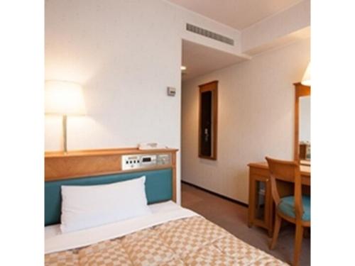 Hotel St Palace Kurayoshi - Vacation STAY 82269房間的床