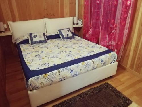 Giường trong phòng chung tại Lupetta