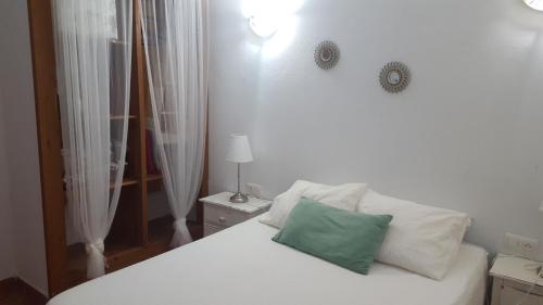 Postel nebo postele na pokoji v ubytování Casa Baro